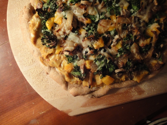 Homemade Pizza with Kale, Caramelized Onions, and Savory Sweet Potato Sauce